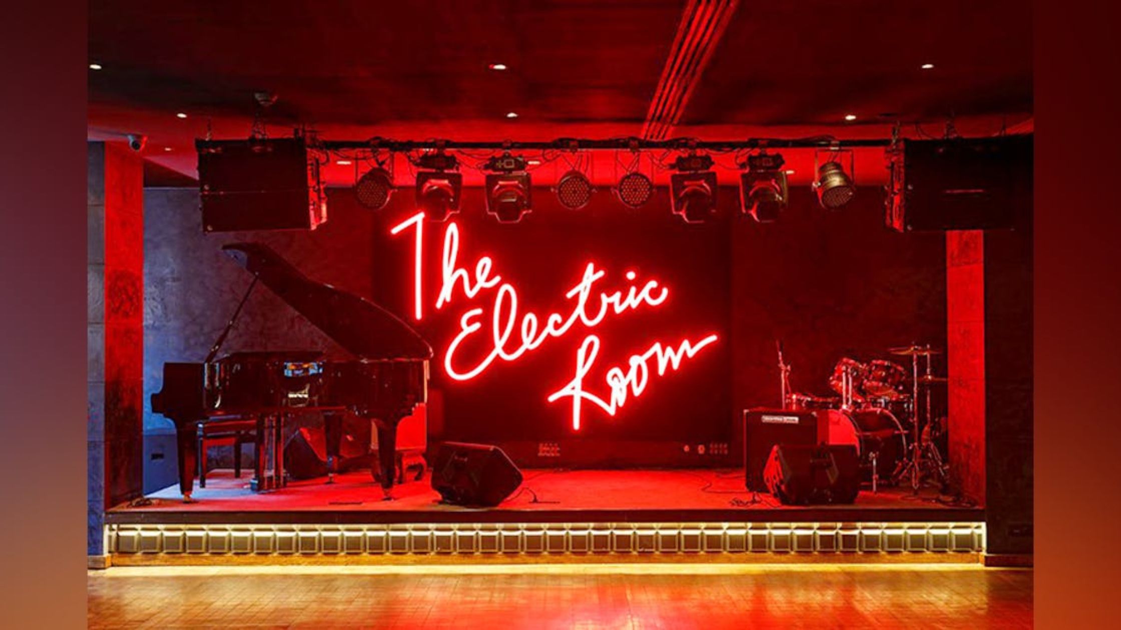 The Electric Room bar with red light with dark mode 